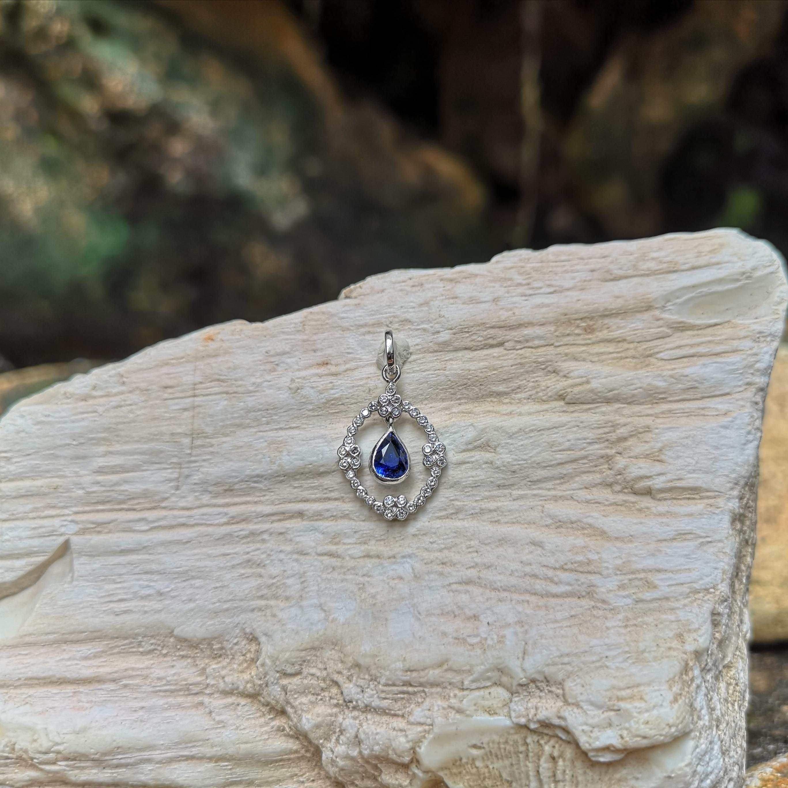 Pear Cut Blue Sapphire with Diamond Pendant Set in 18 Karat White Gold Settings For Sale
