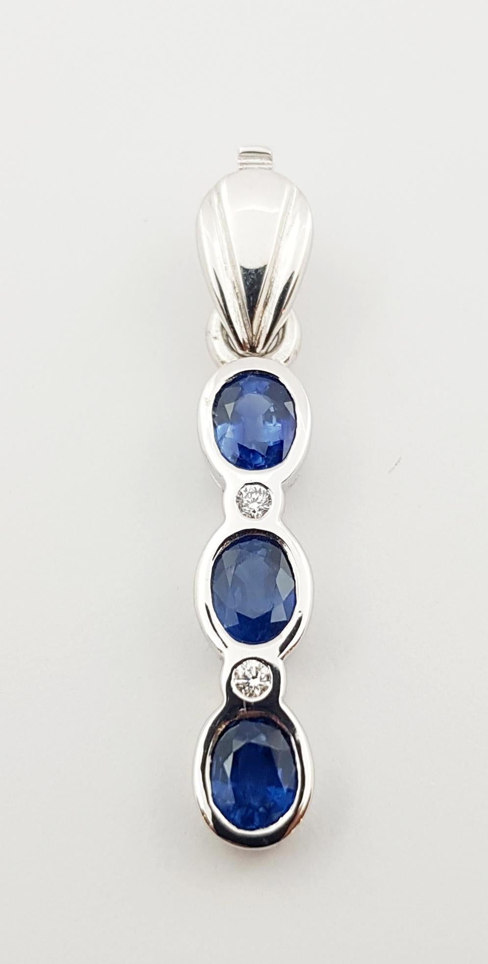 Contemporary Blue Sapphire with Diamond Pendant Set in 18 Karat White Gold Settings For Sale