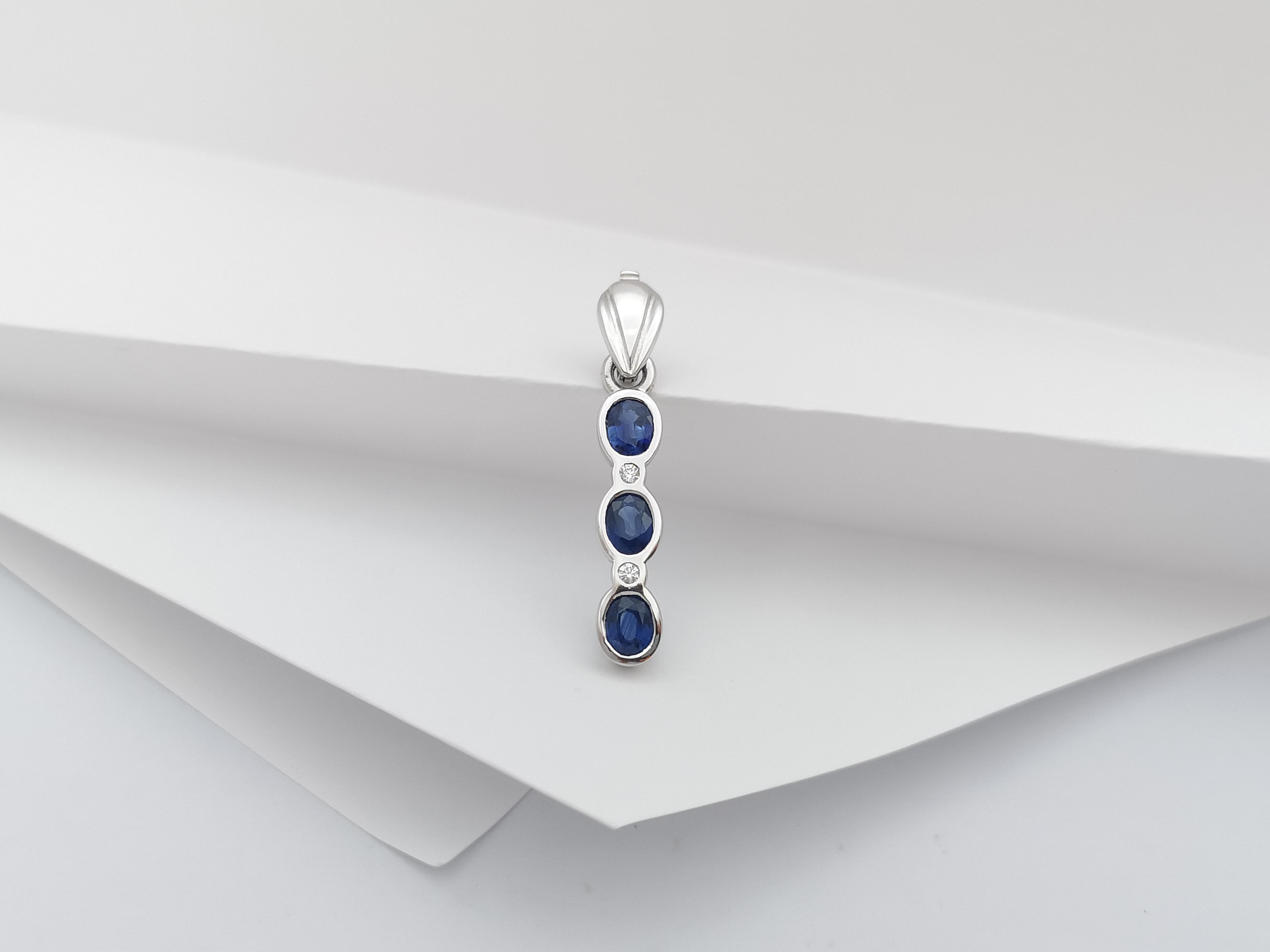 Oval Cut Blue Sapphire with Diamond Pendant Set in 18 Karat White Gold Settings For Sale