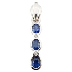 Blue Sapphire with Diamond Pendant Set in 18 Karat White Gold Settings