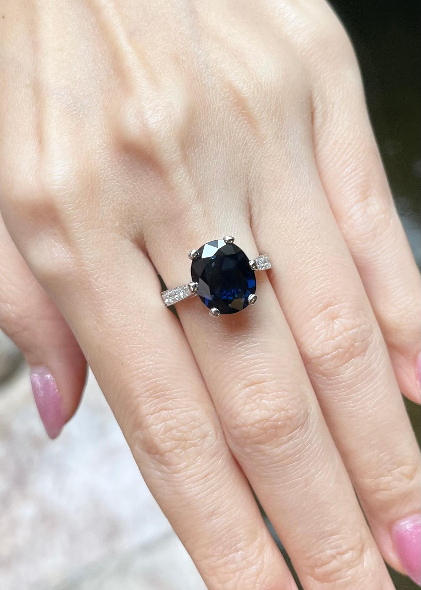 Oval Cut Blue Sapphire with Diamond Ring in 18K White Gold Setting For Sale