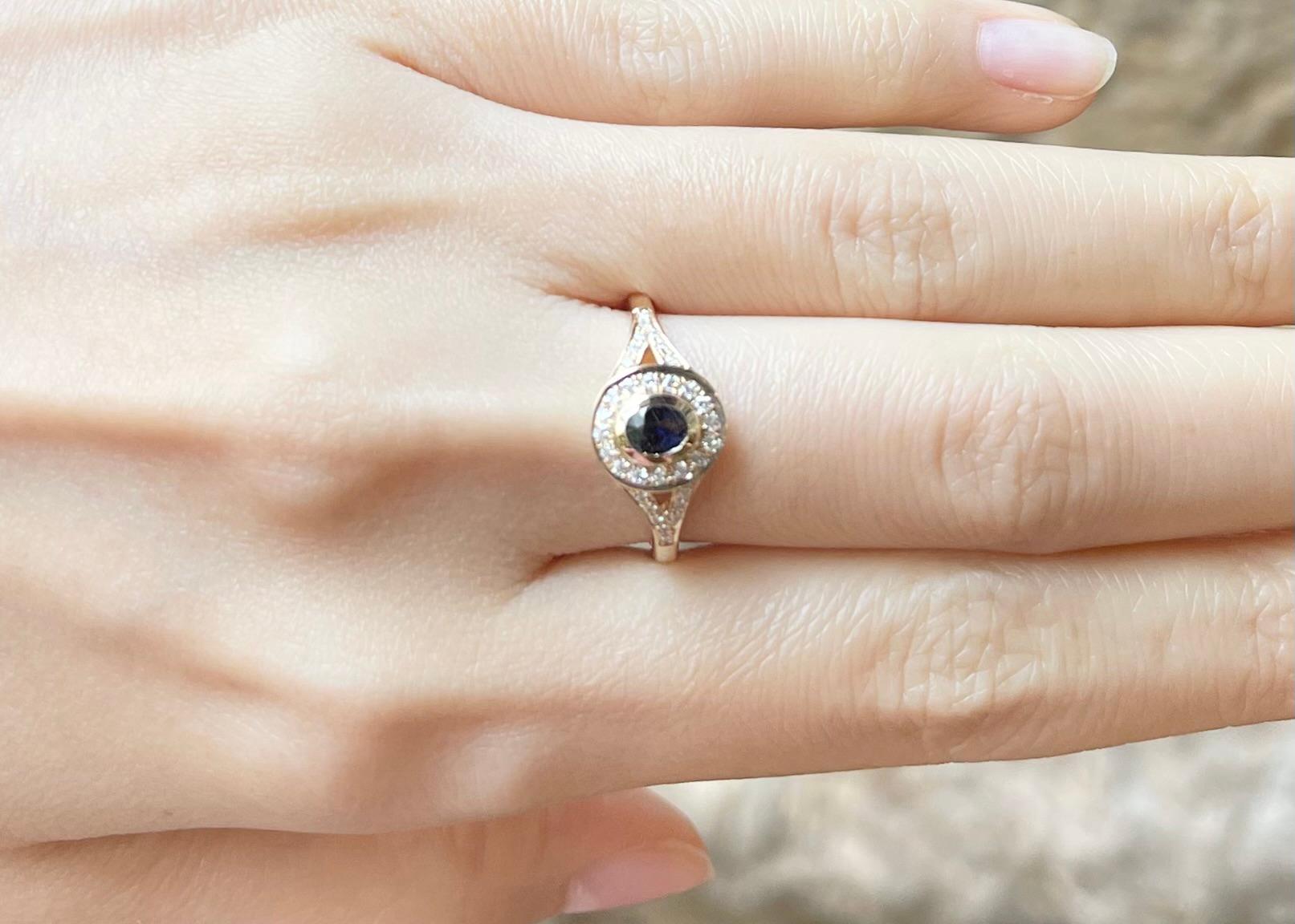 Contemporary Blue Sapphire with Diamond Ring set in 14K Gold Settings For Sale