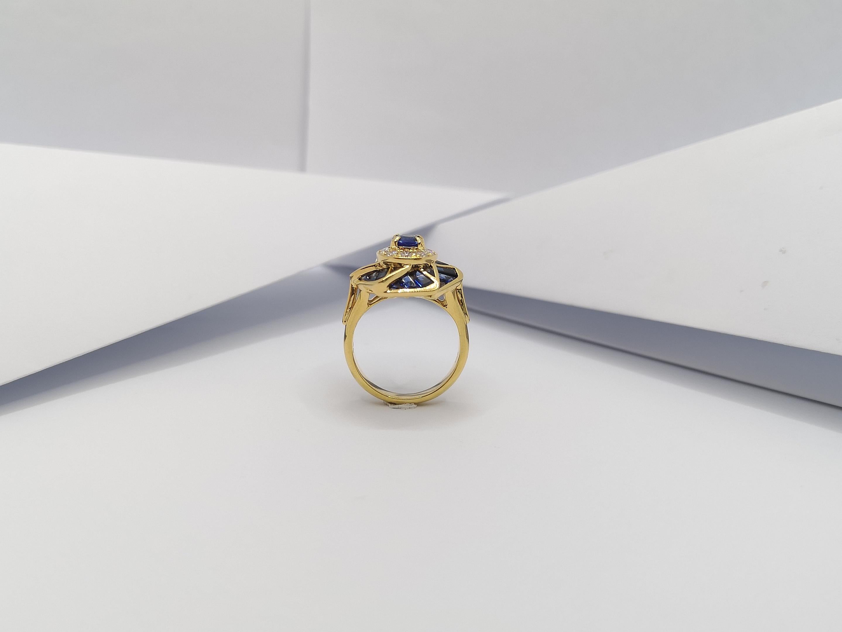 Bague en or 18 carats sertie d'un saphir bleu et de diamants en vente 6