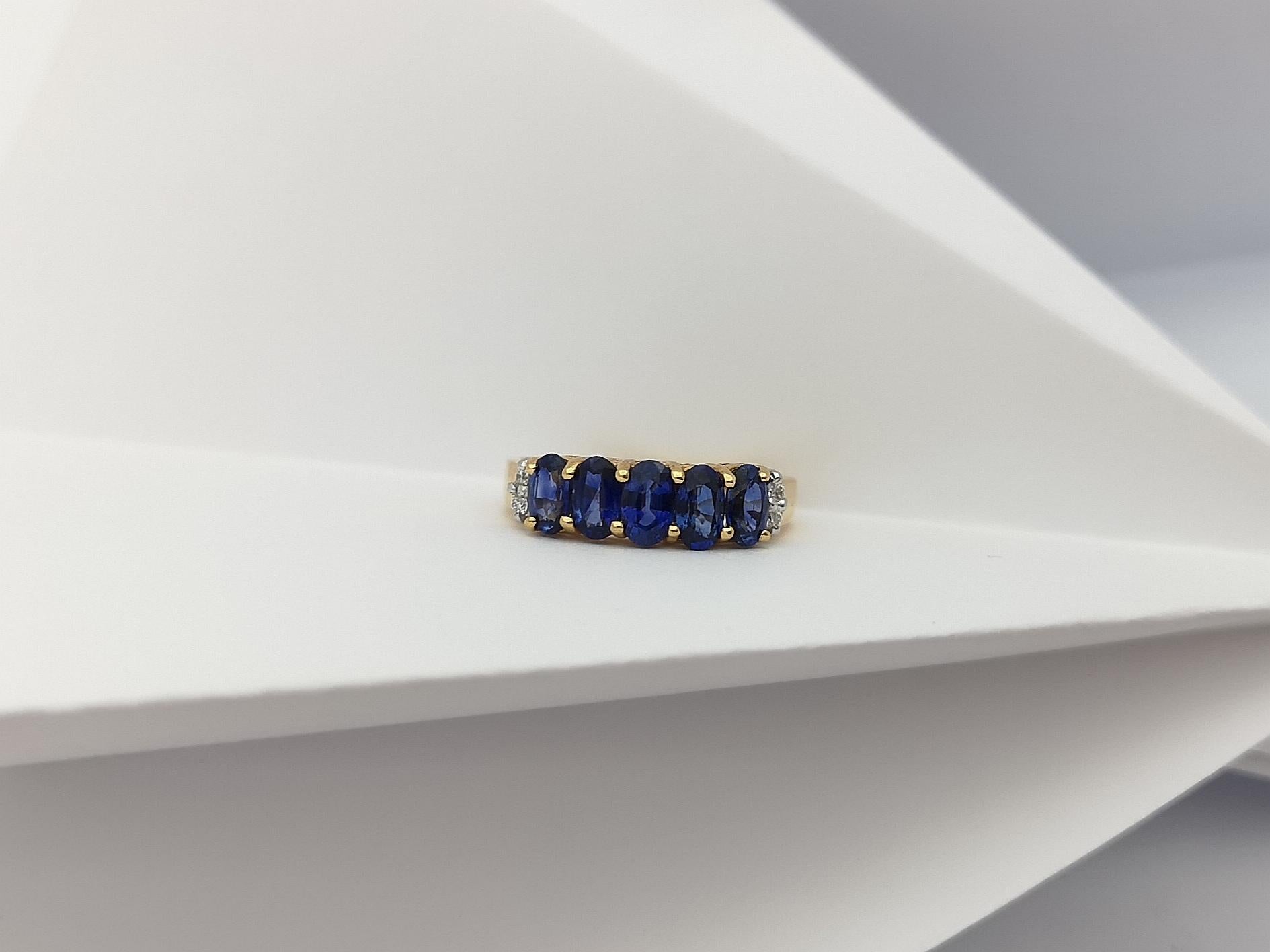 Bague en or 18 carats sertie d'un saphir bleu et de diamants en vente 6