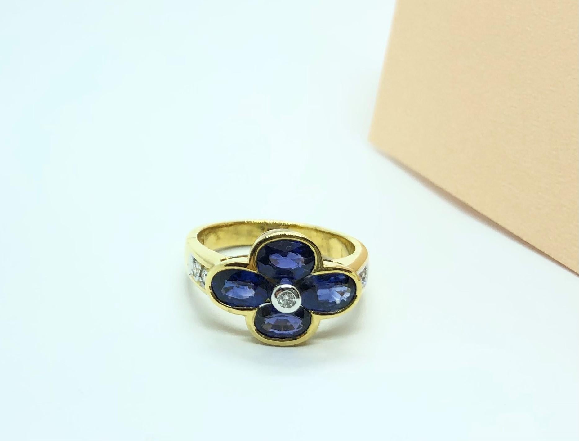 Bague en saphir bleu et diamants sertis en or 18 carats en vente 7