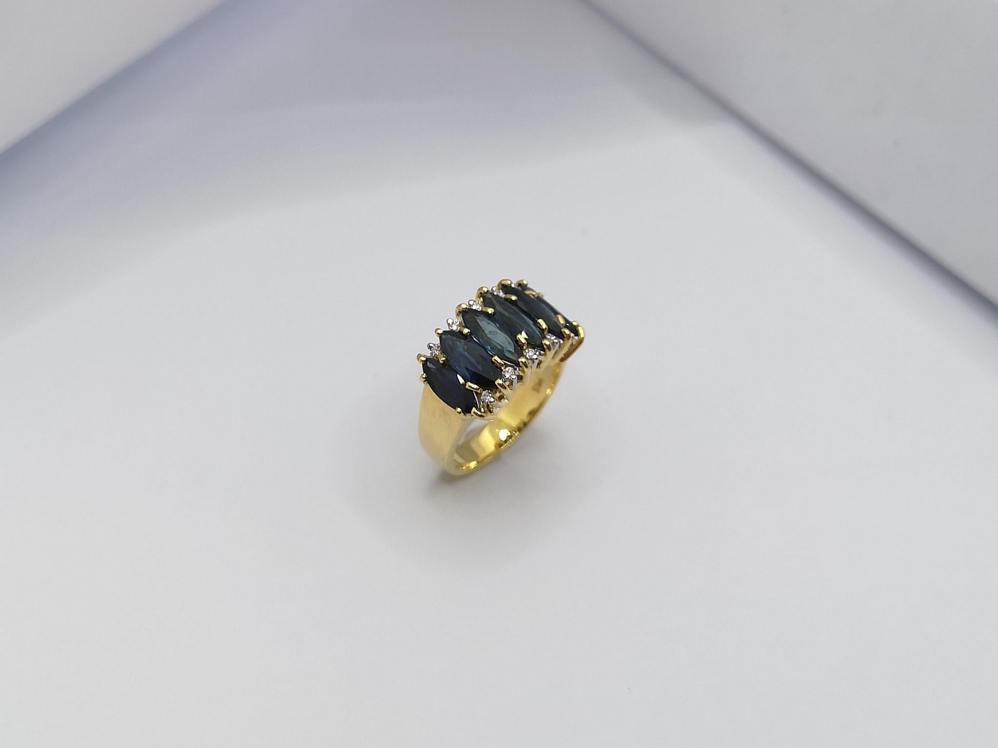 Bague en or 18 carats sertie de saphirs bleus et de diamants en vente 8