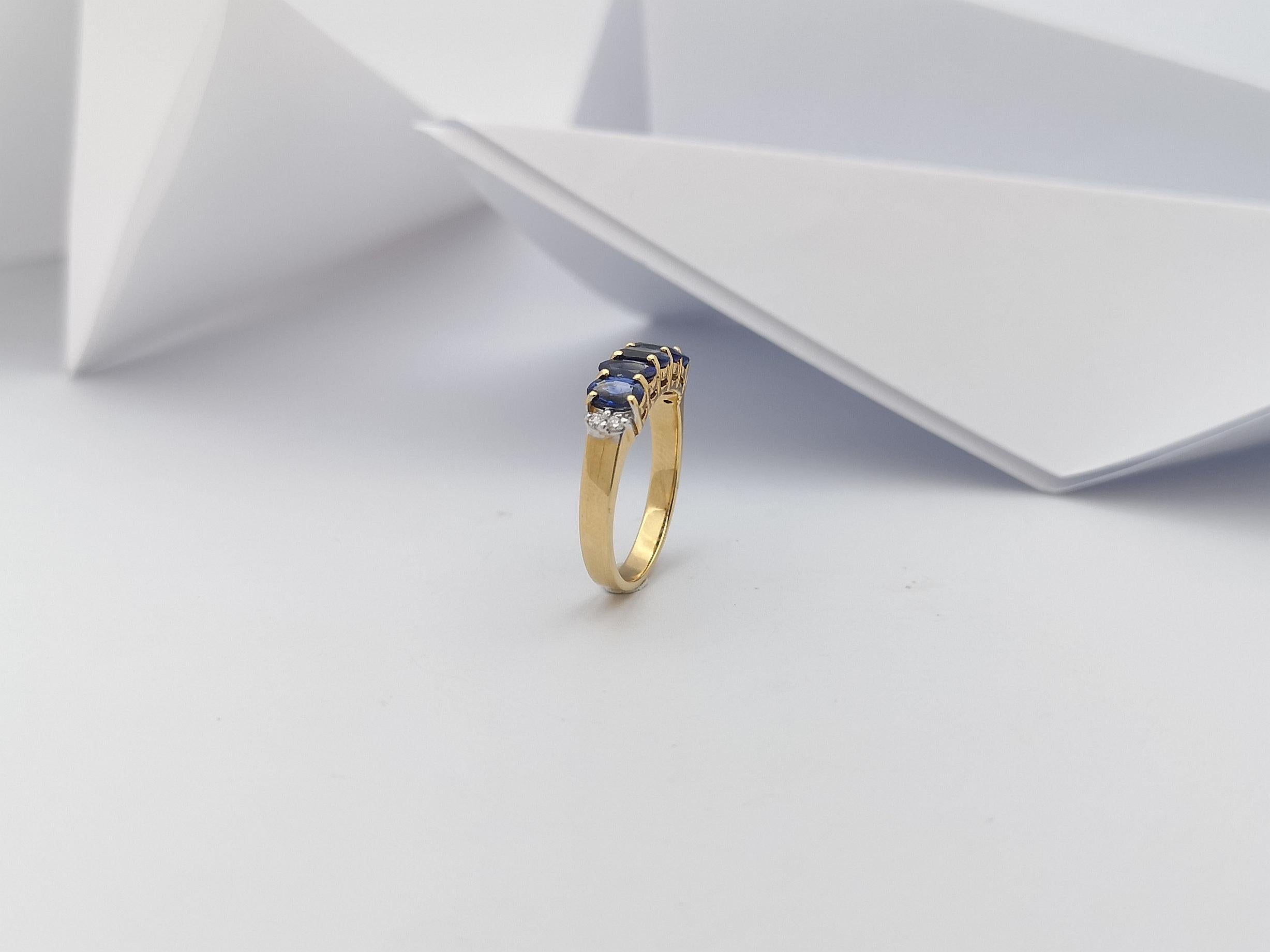 Bague en or 18 carats sertie d'un saphir bleu et de diamants en vente 8