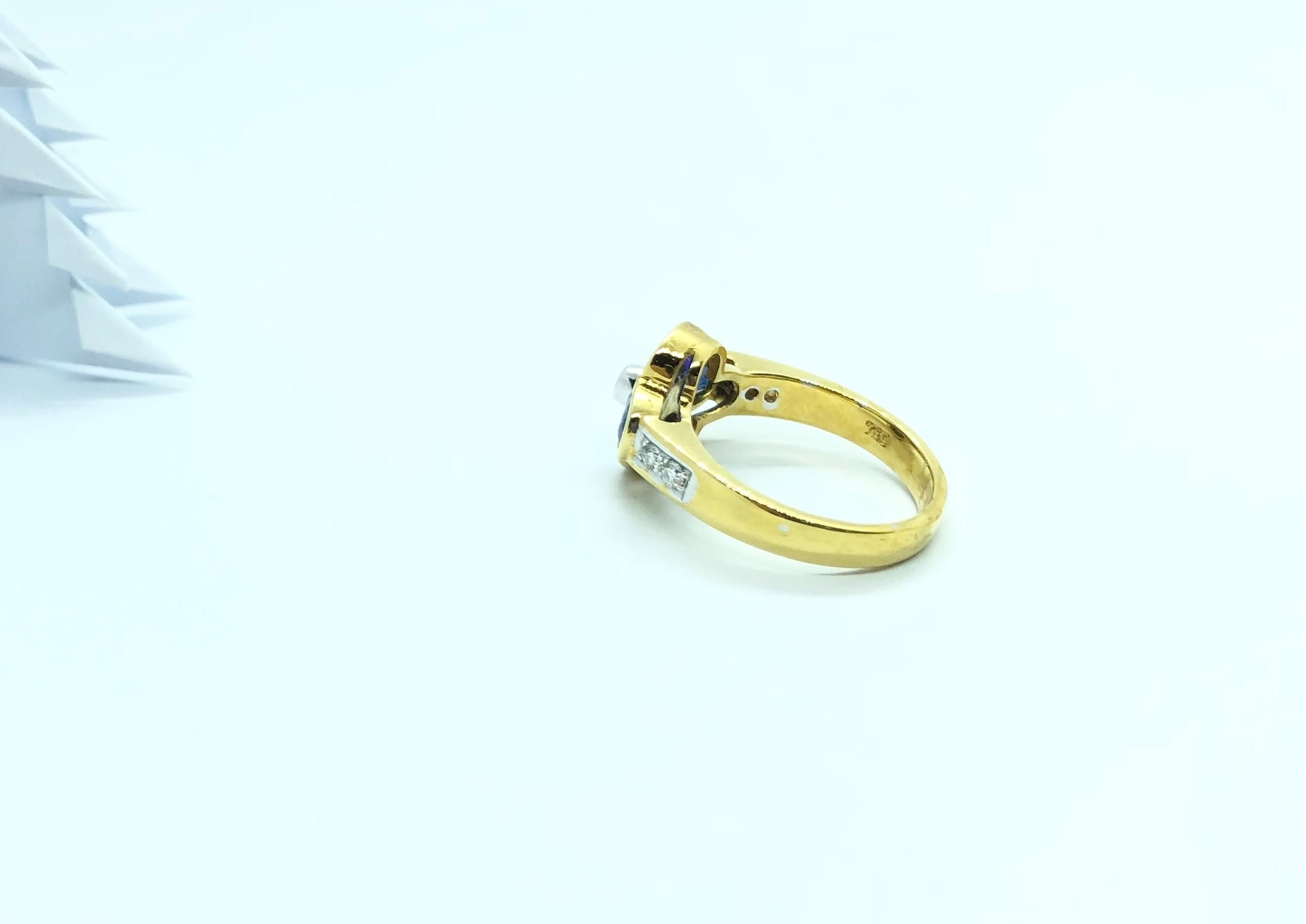Bague en saphir bleu et diamants sertis en or 18 carats en vente 9