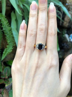 Blue Sapphire with Diamond Ring Set in 18 Karat Gold Settings