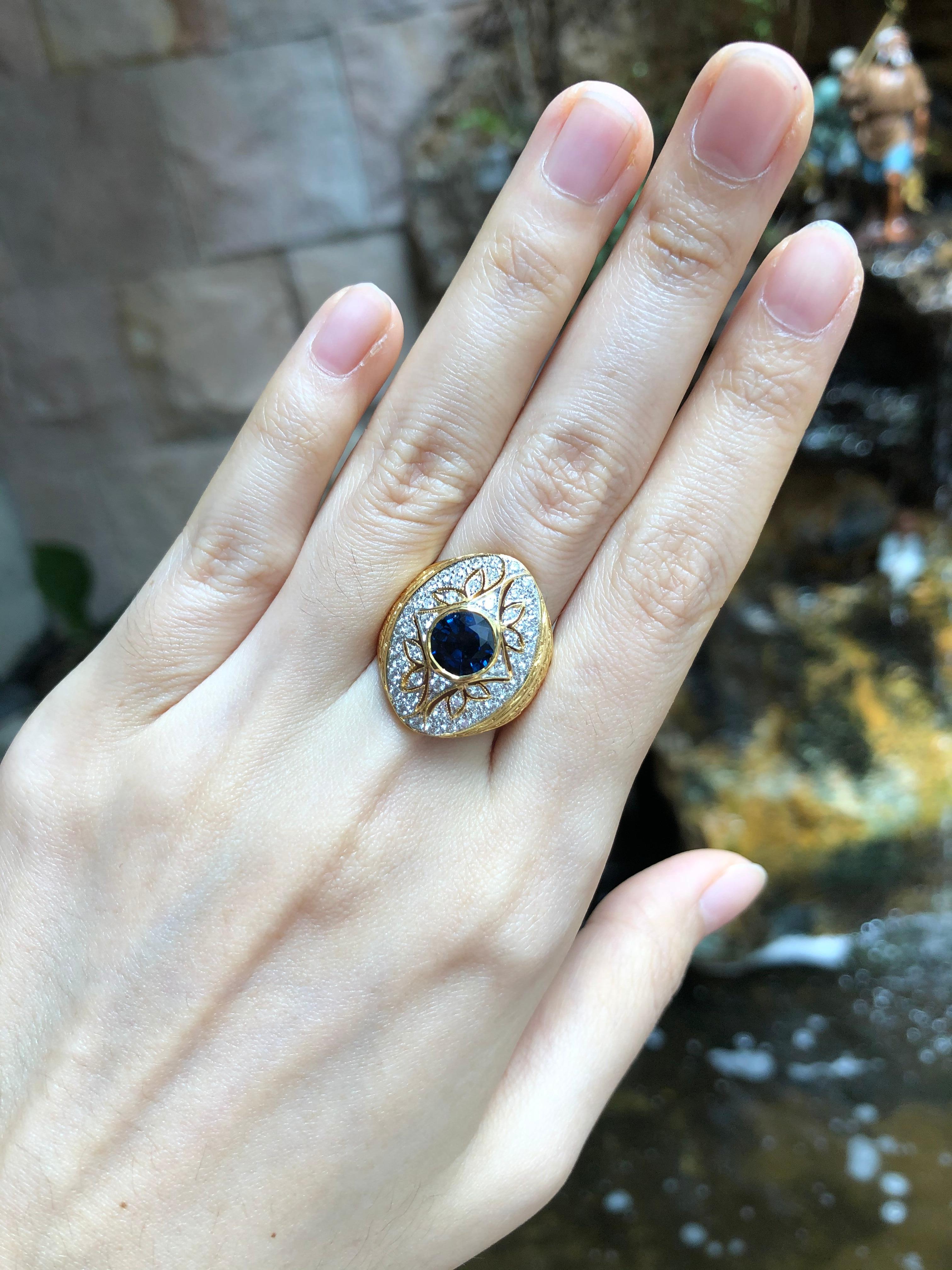 Blue Sapphire 1.81 carats with Diamond 0.73 carat Ring set in 18 Karat Gold Settings

Width:  1.7 cm 
Length: 2.4 cm
Ring Size: 57
Total Weight: 11.14 grams

