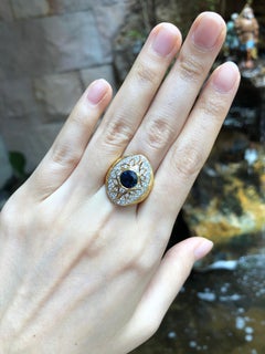 Blue Sapphire with Diamond Ring Set in 18 Karat Gold Settings