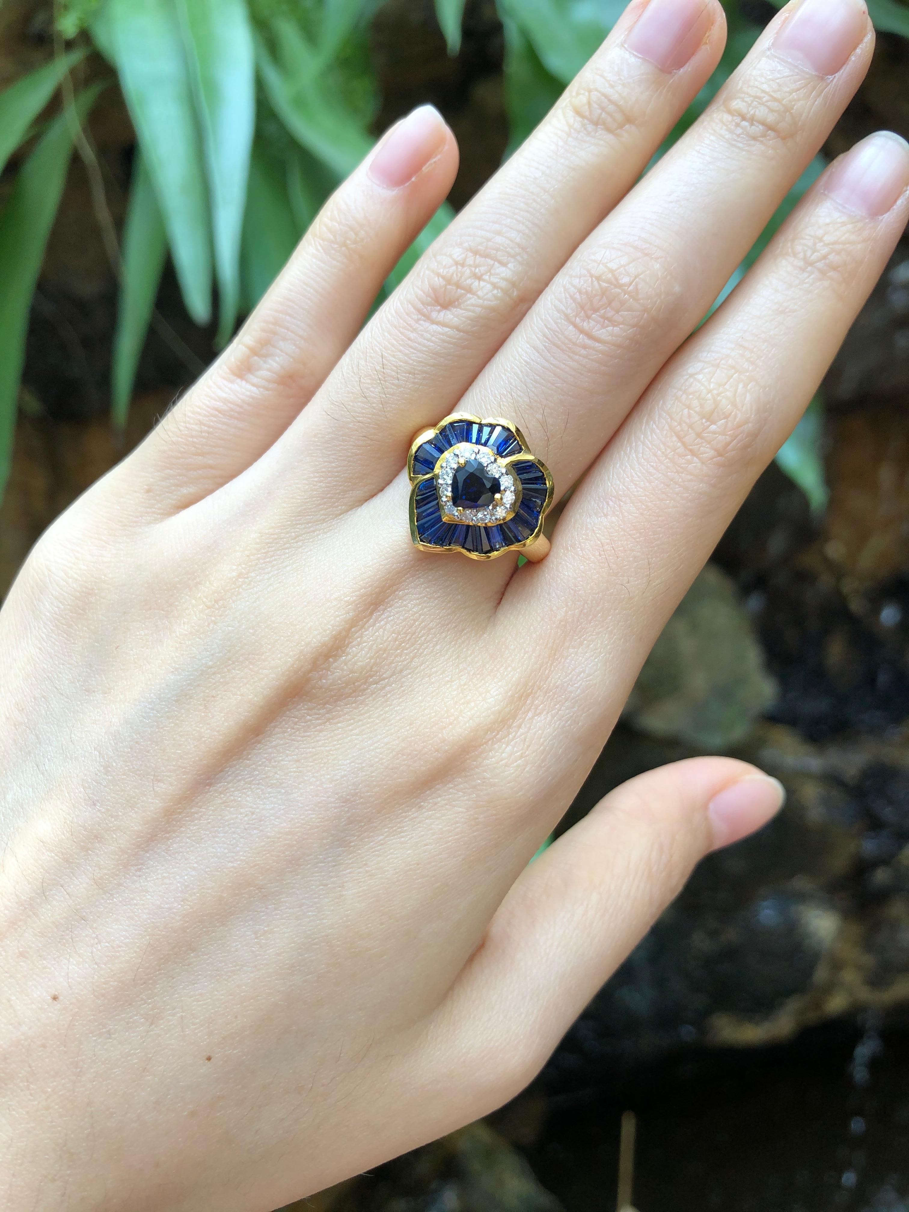 Blue Sapphire 3.20 carats with Diamond Ring set in 18 Karat Gold Settings
Width:  1.6 cm 
Length: 1.7 cm
Ring Size: 55
Total Weight: 6.06 grams

