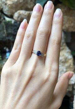 Blue Sapphire with Diamond Ring Set in 18 Karat Gold Settings
