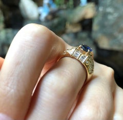 Blue Sapphire with Diamond Ring Set in 18 Karat Gold Settings