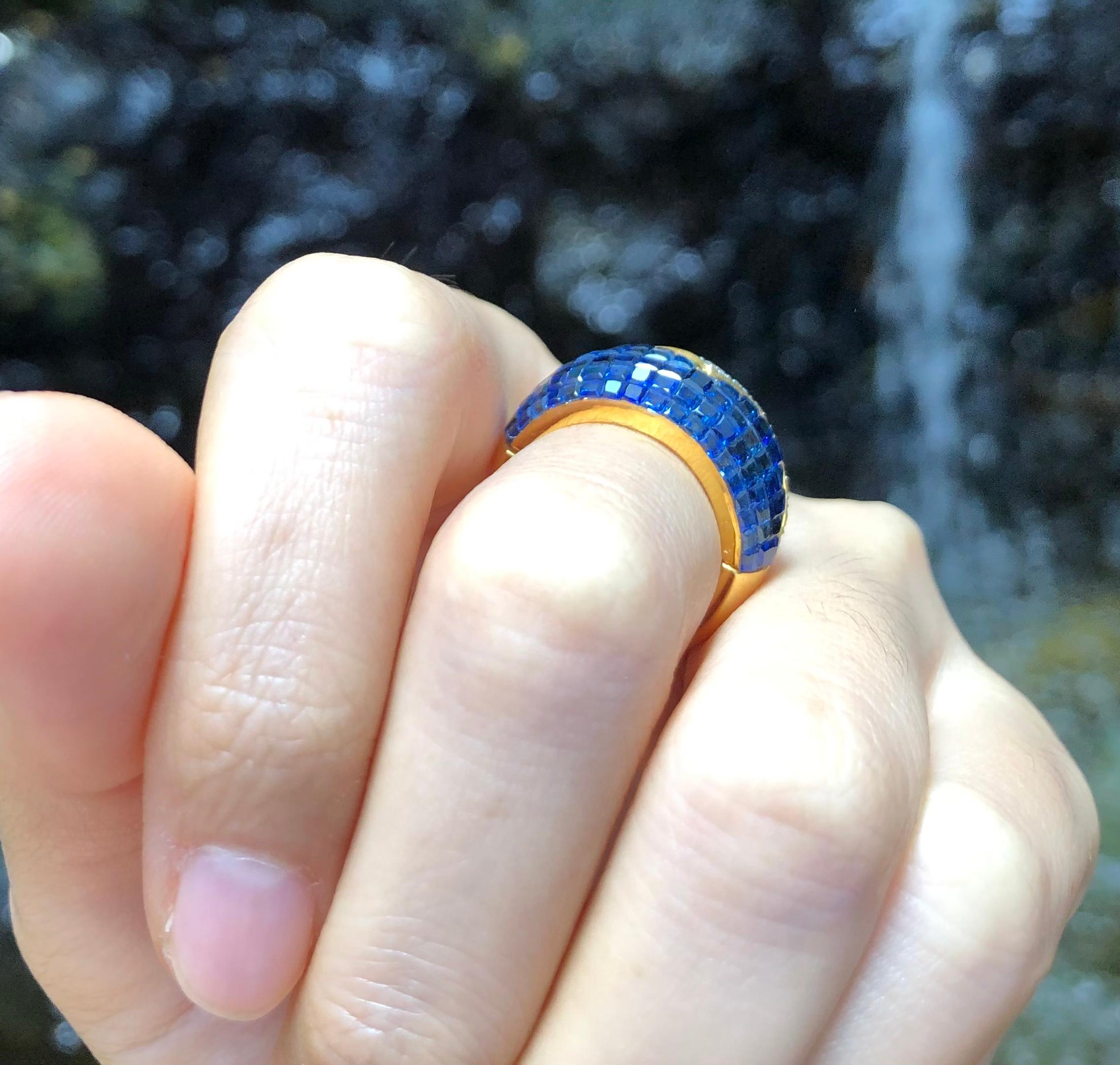 Blue Sapphire 10.14 carats with Diamond 0.53 carat Ring set in 18 Karat Gold Settings

Width:  2.2 cm 
Length:  1.2 cm
Ring Size: 51
Total Weight: 11.94 grams

