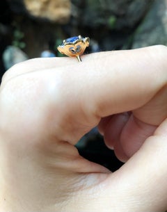 Blue Sapphire with Diamond Ring Set in 18 Karat Gold Settings