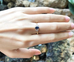 Blue Sapphire with Diamond Ring Set in 18 Karat Gold Settings