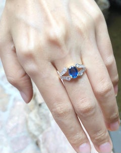 Blue Sapphire with Diamond Ring Set in 18 Karat Gold Settings