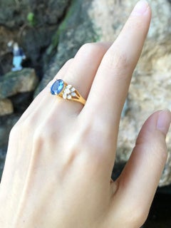 Blue Sapphire with Diamond Ring Set in 18 Karat Gold Settings