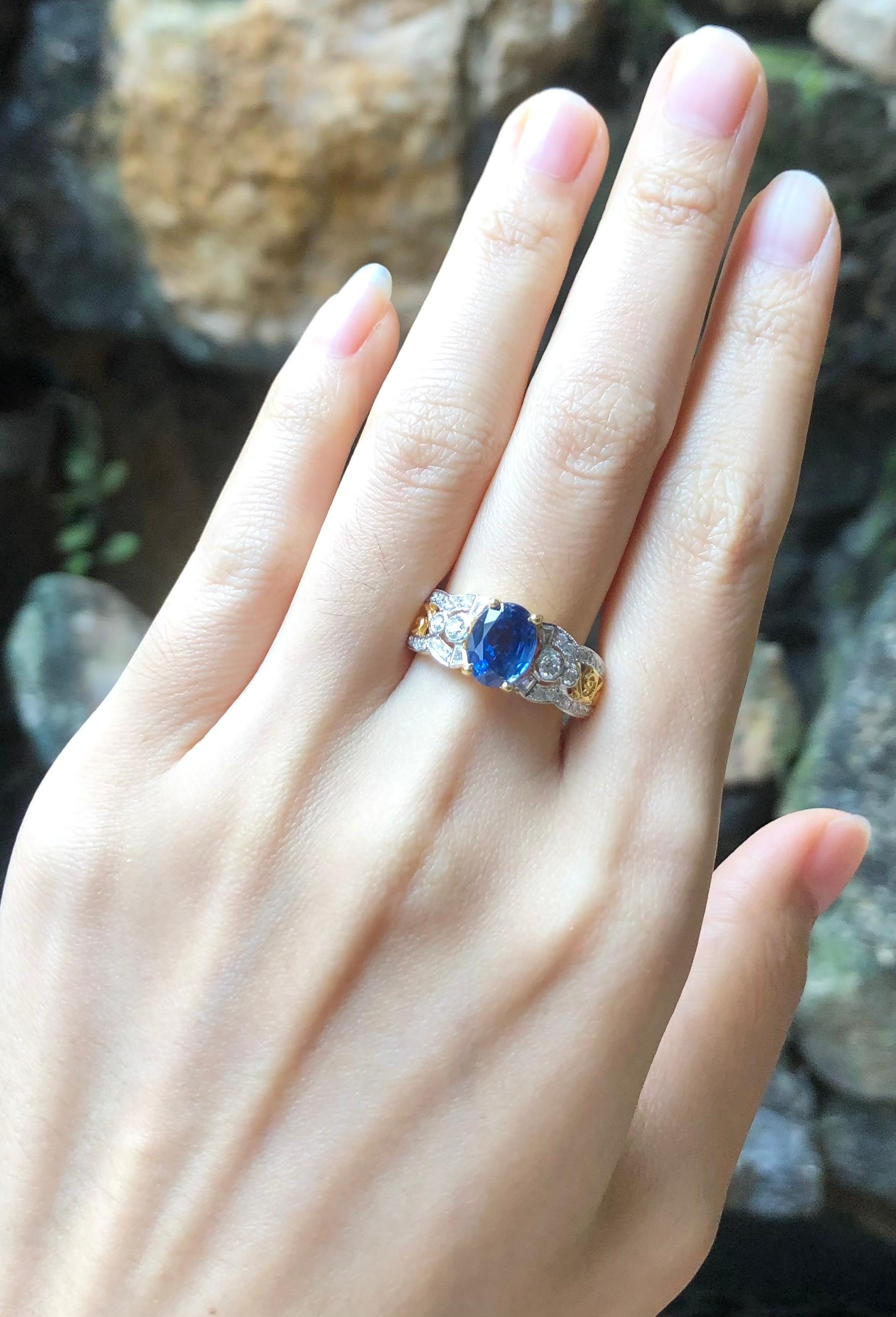 Blue Sapphire 2.23 carats with Diamond 0.68 carat Ring set in 18 Karat Gold Settings

Width:  0.6 cm 
Length: 0.9 cm
Ring Size: 57
Total Weight: 5.54 grams

