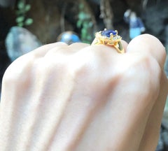 Blue Sapphire with Diamond Ring Set in 18 Karat Gold Settings