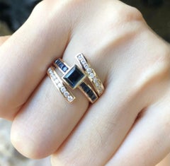 Blue Sapphire with Diamond Ring Set in 18 Karat Gold Settings