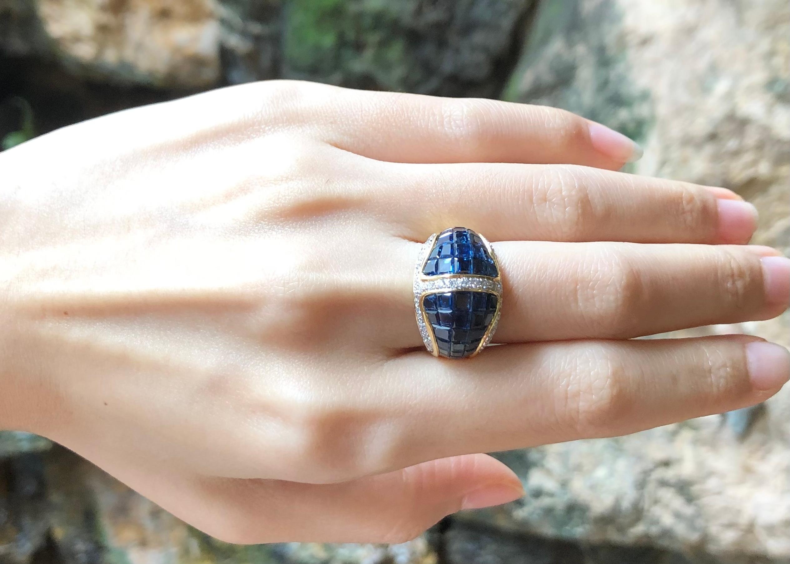 Blue Sapphire 10.54 carats with Diamond 0.57 carat Ring set in 18 Karat Gold Settings

Width:  2.0 cm 
Length: 1.4 cm
Ring Size: 52
Total Weight: 10.54 grams


