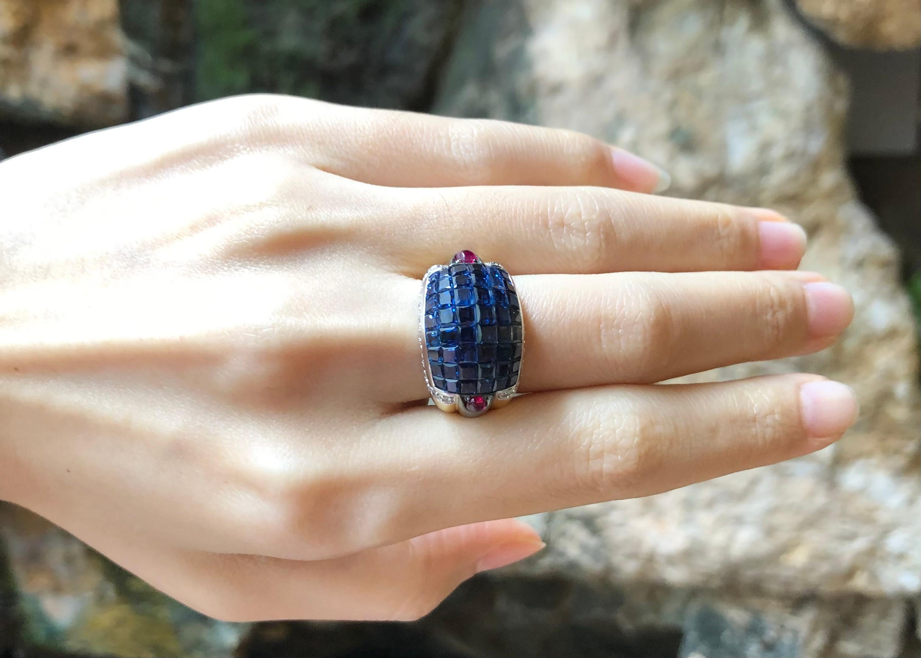 Blue Sapphire 12.50 carats with Diamond 0.32 carats  Ring set in 18 Karat Gold Settings

Width:  2.2 cm 
Length: 1.4 cm
Ring Size: 52
Total Weight: 12.6 grams


