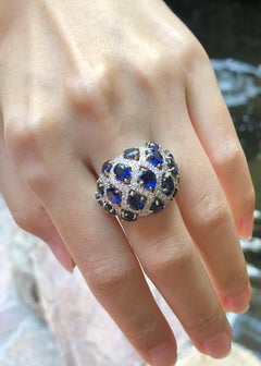 Blue Sapphire with Diamond Ring Set in 18 Karat Gold Settings