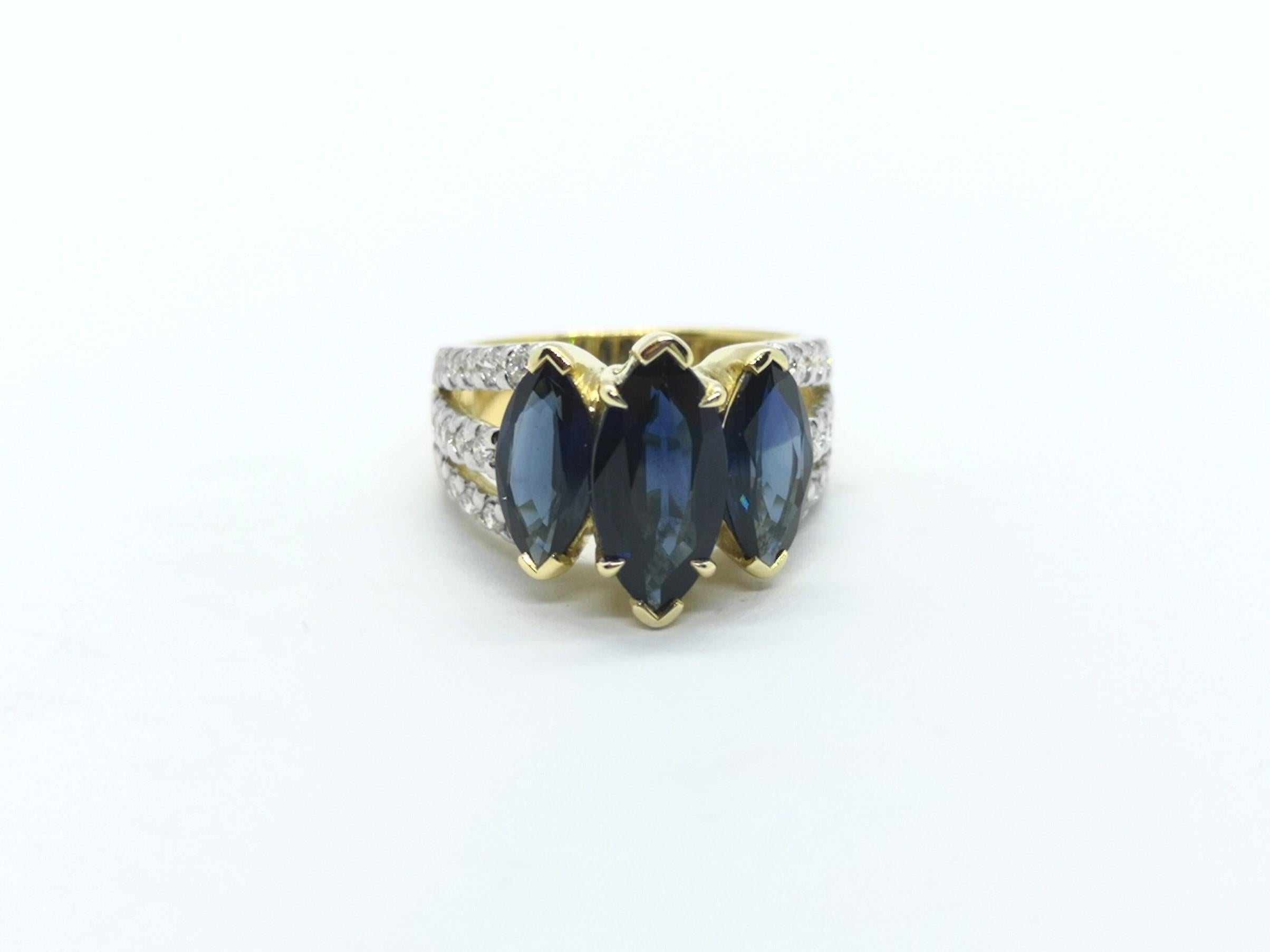 Modern Blue Sapphire with Diamond Ring Set in 18 Karat Gold Settings For Sale