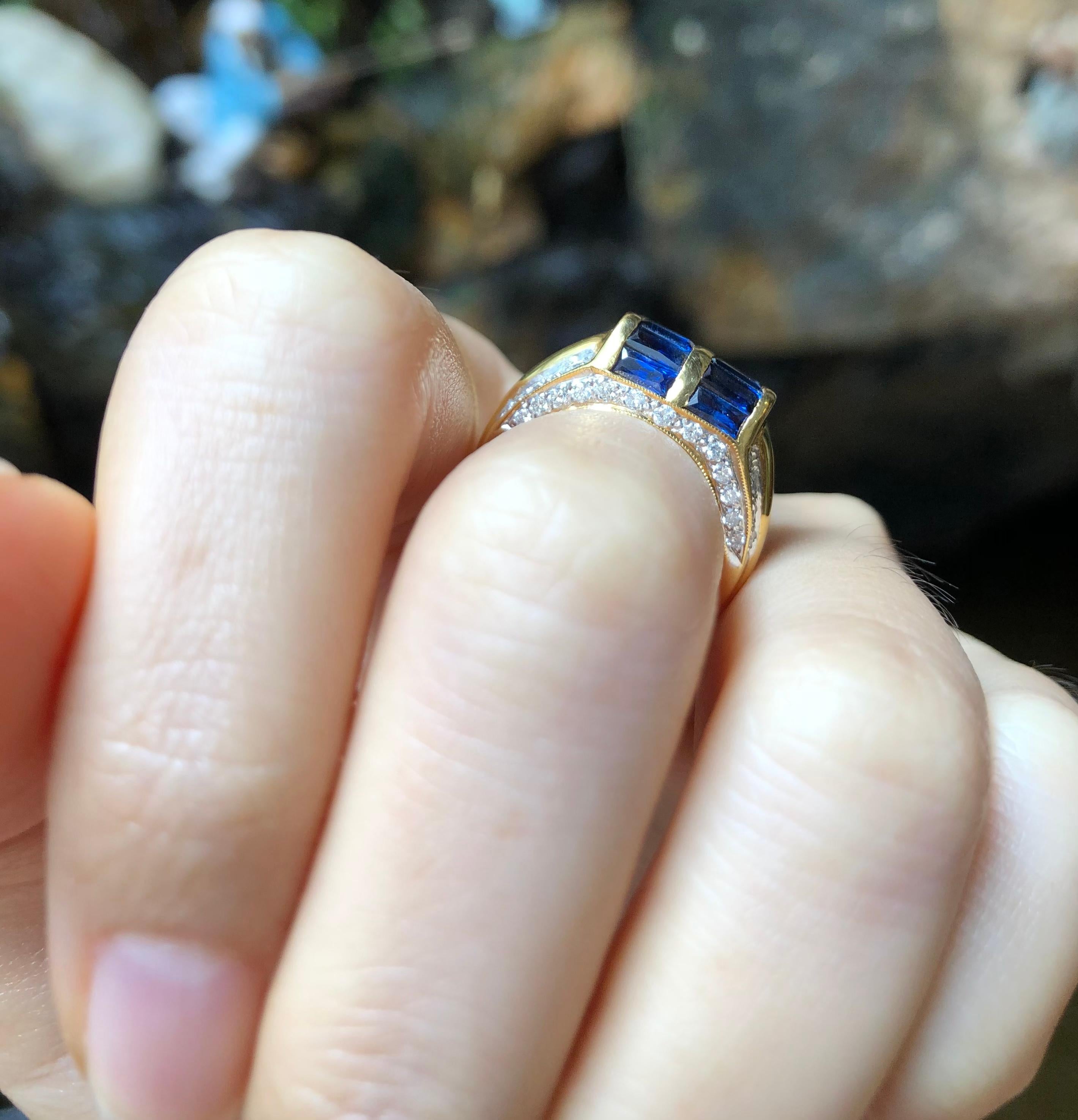 Contemporain Bague en or 18 carats avec saphir bleu et diamant en vente