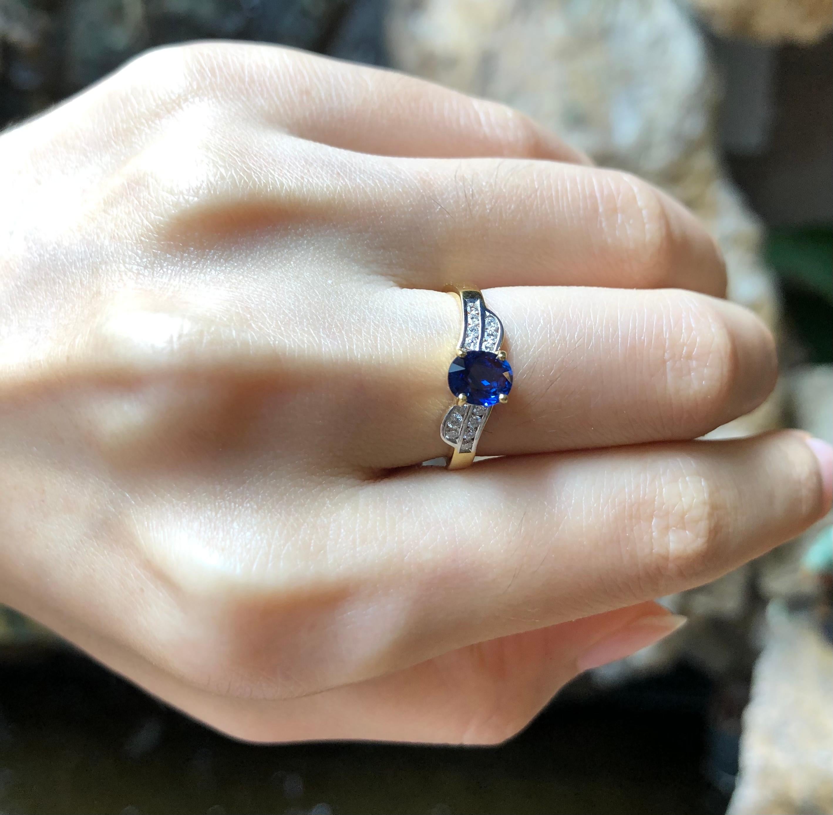 Oval Cut Blue Sapphire with Diamond Ring Set in 18 Karat Gold Settings For Sale