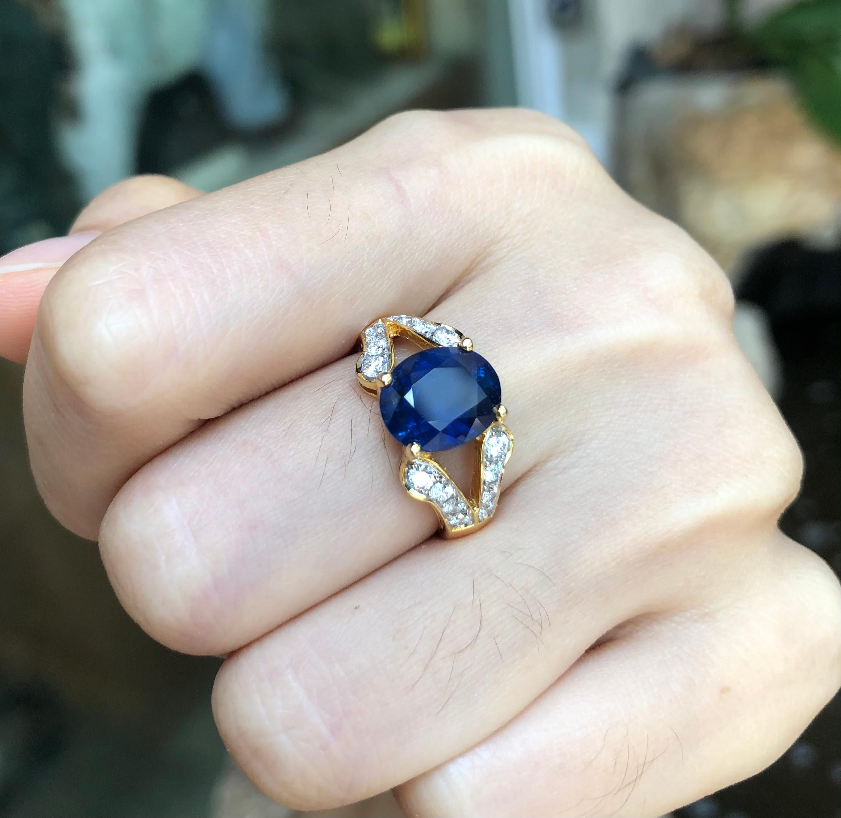 Oval Cut Blue Sapphire with Diamond Ring Set in 18 Karat Gold Settings For Sale