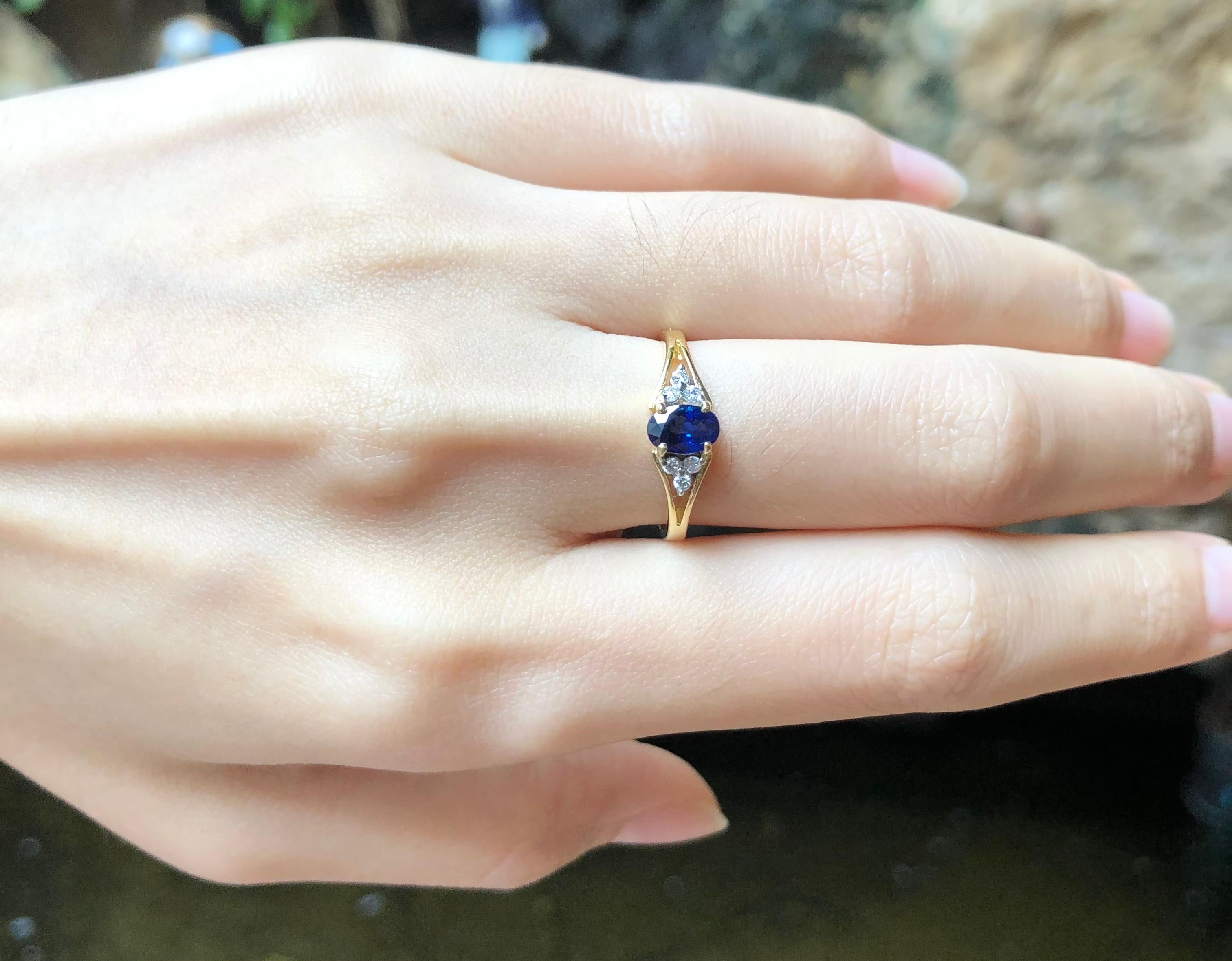 Oval Cut Blue Sapphire with Diamond Ring Set in 18 Karat Gold Settings For Sale