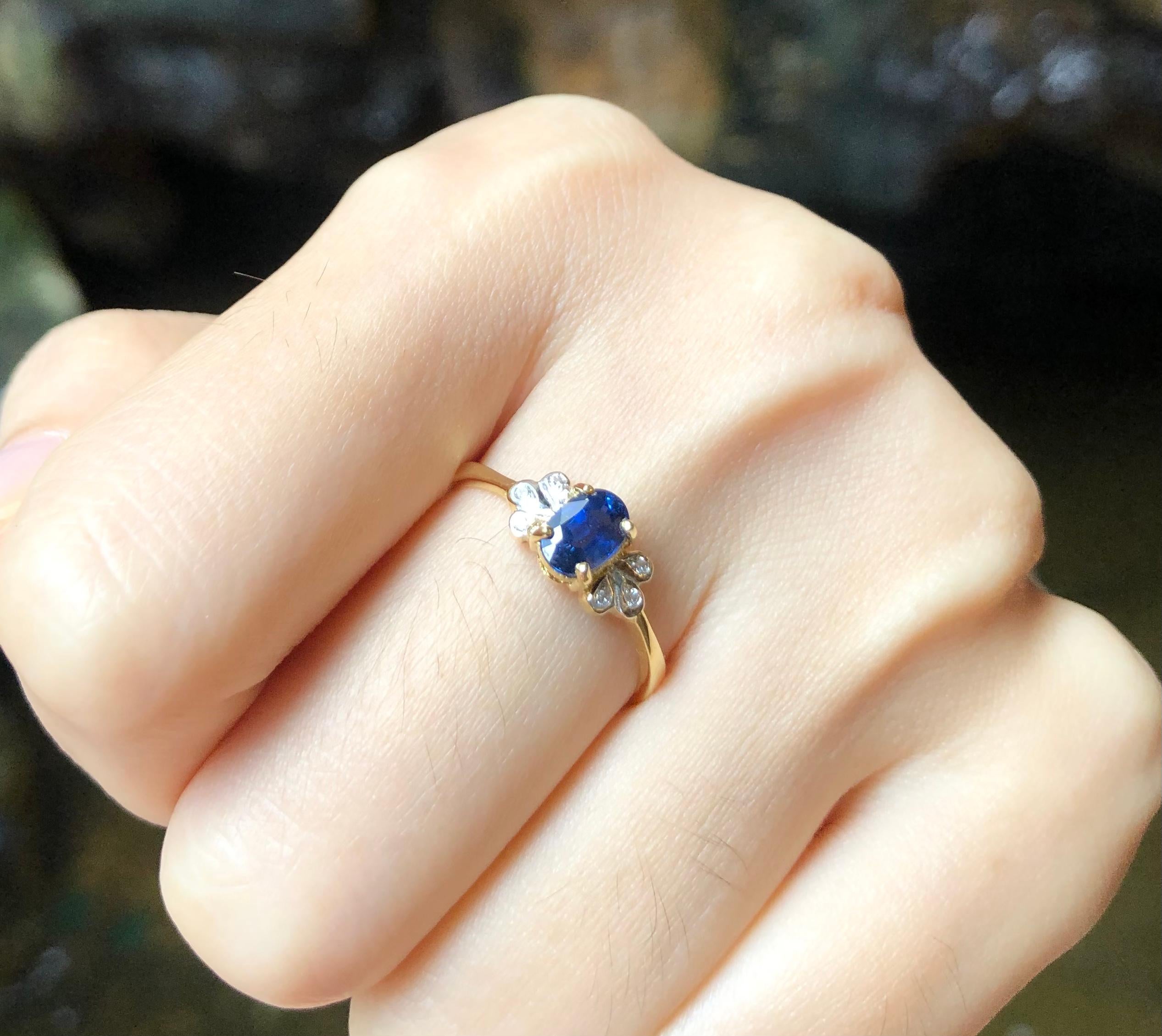 Oval Cut Blue Sapphire with Diamond Ring Set in 18 Karat Gold Settings For Sale