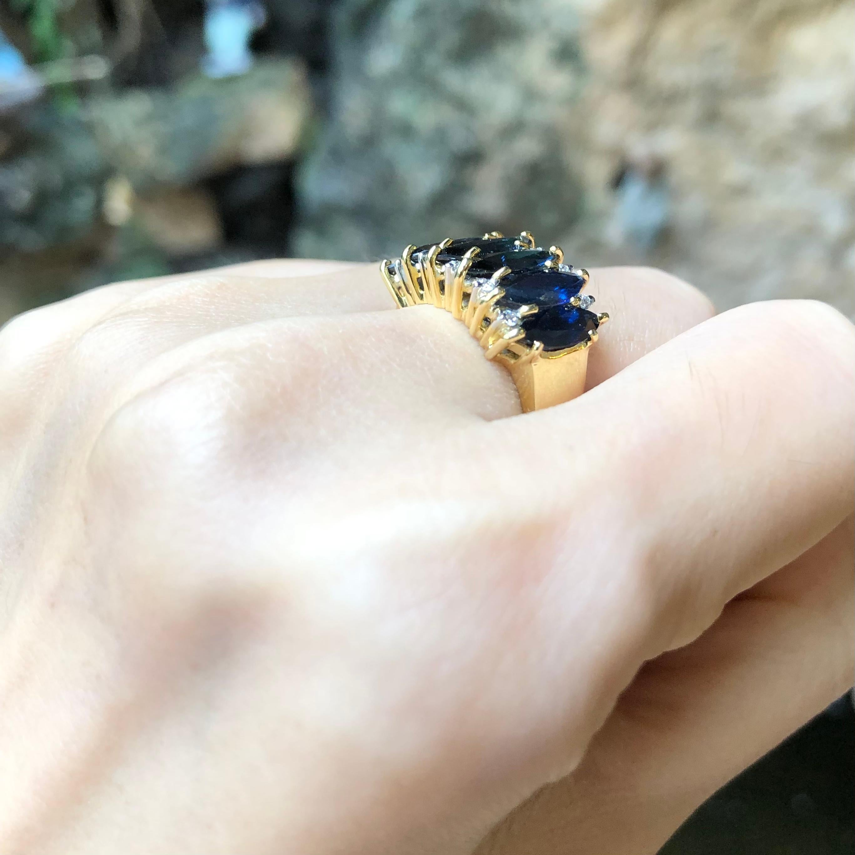 Marquise Cut Blue Sapphire with Diamond Ring Set in 18 Karat Gold Settings For Sale