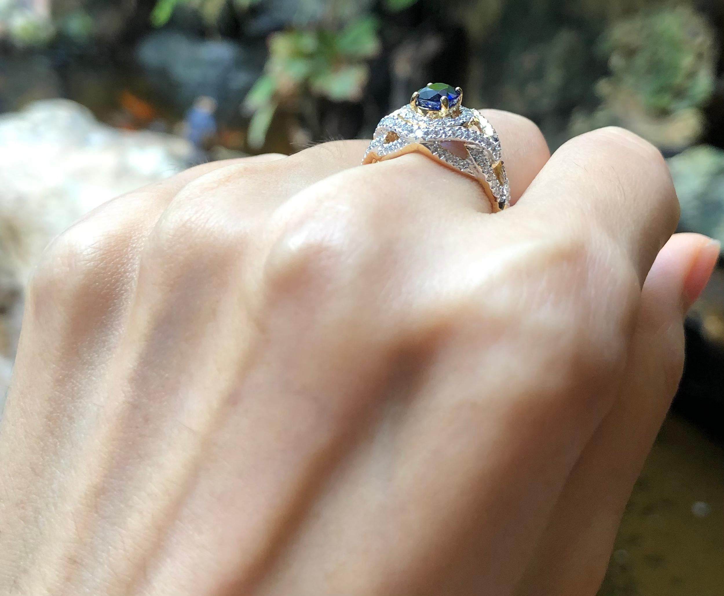 Contemporary Blue Sapphire with Diamond Ring Set in 18 Karat Gold Settings For Sale