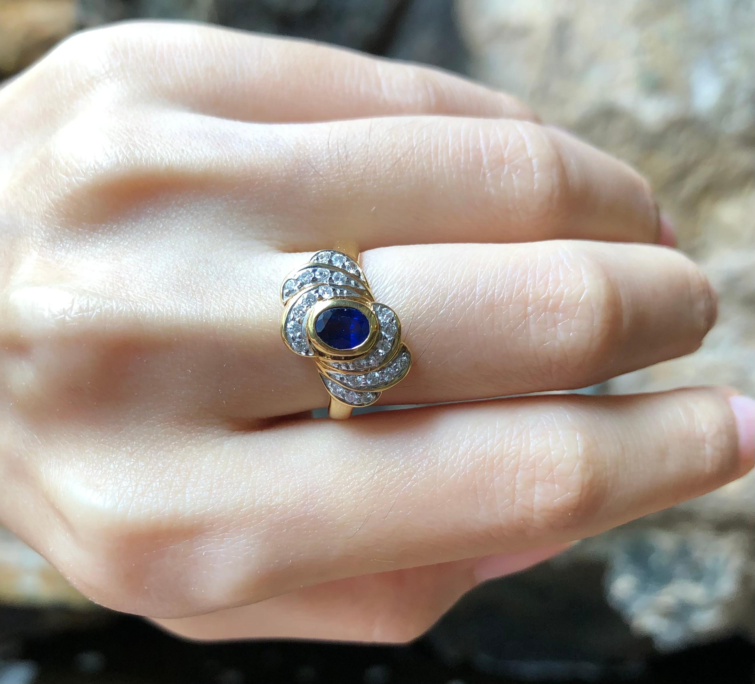 Oval Cut Blue Sapphire with Diamond Ring Set in 18 Karat Gold Settings For Sale