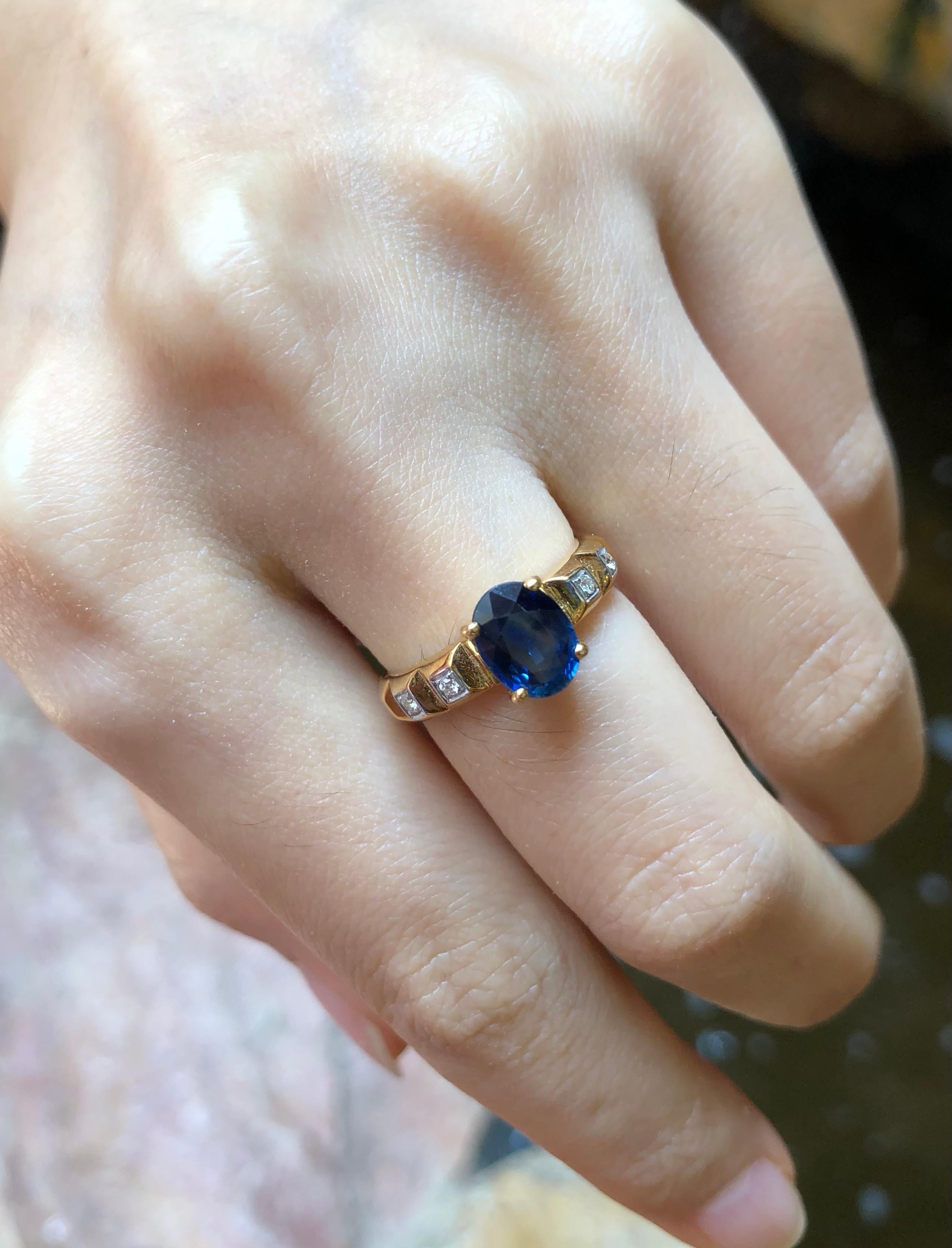 Women's Blue Sapphire with Diamond Ring Set in 18 Karat Gold Settings