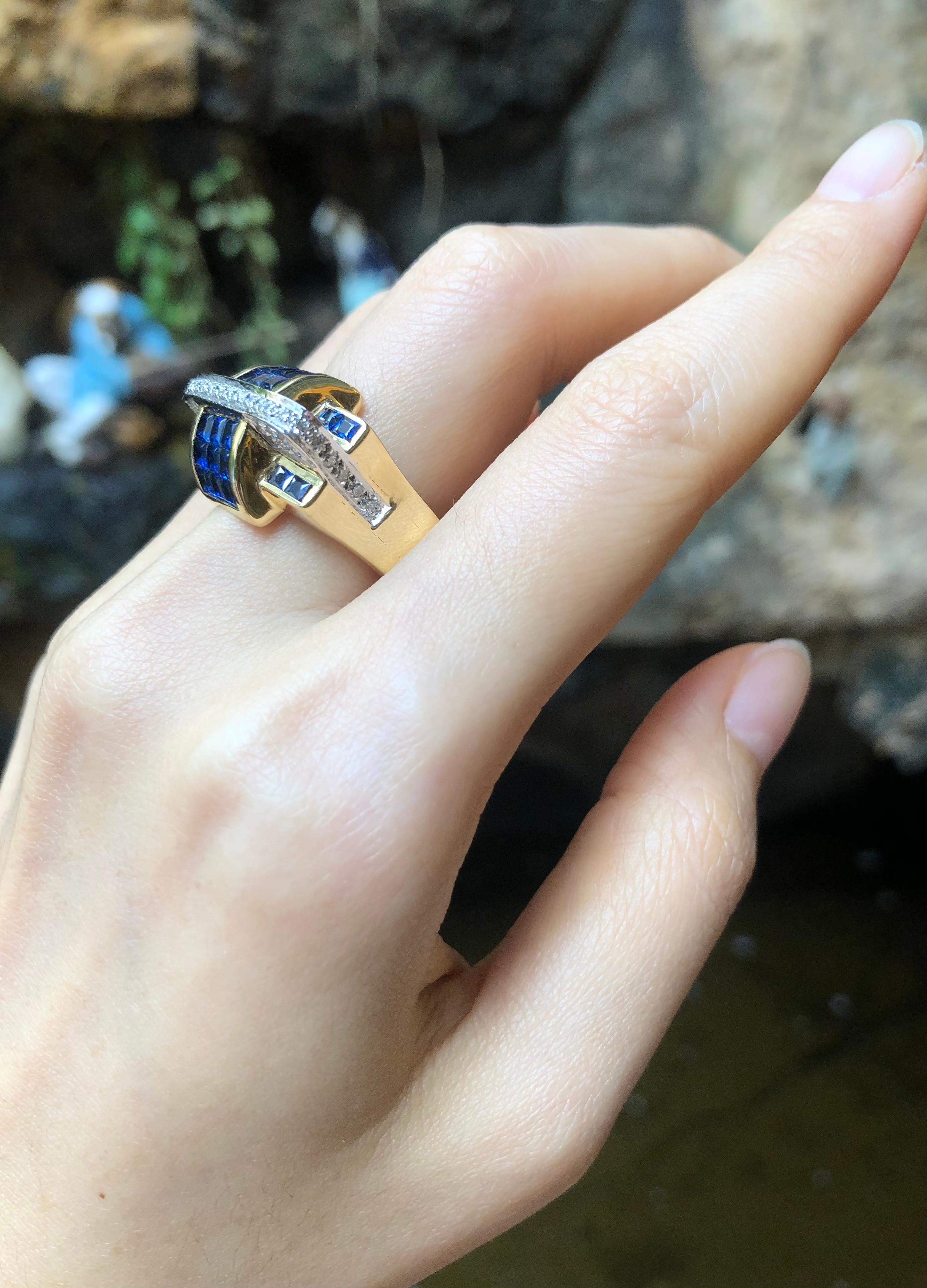 Bague en or 18 carats sertie d'un saphir bleu et de diamants en vente 1