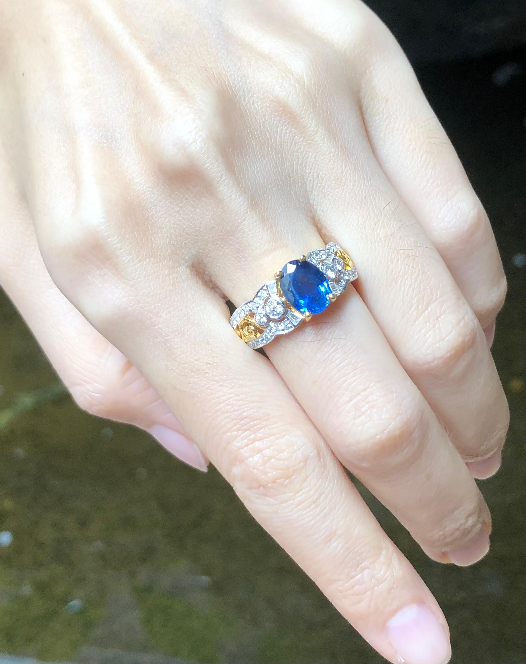 Women's Blue Sapphire  with Diamond Ring set in 18 Karat Gold Settings For Sale