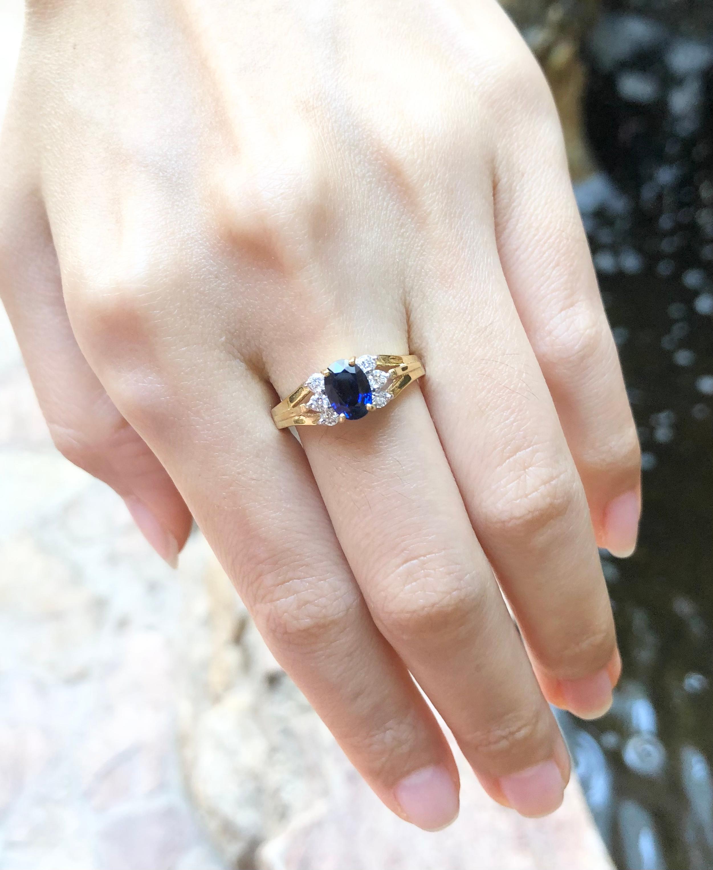 Oval Cut Blue Sapphire with Diamond Ring set in 18 Karat Gold Settings For Sale