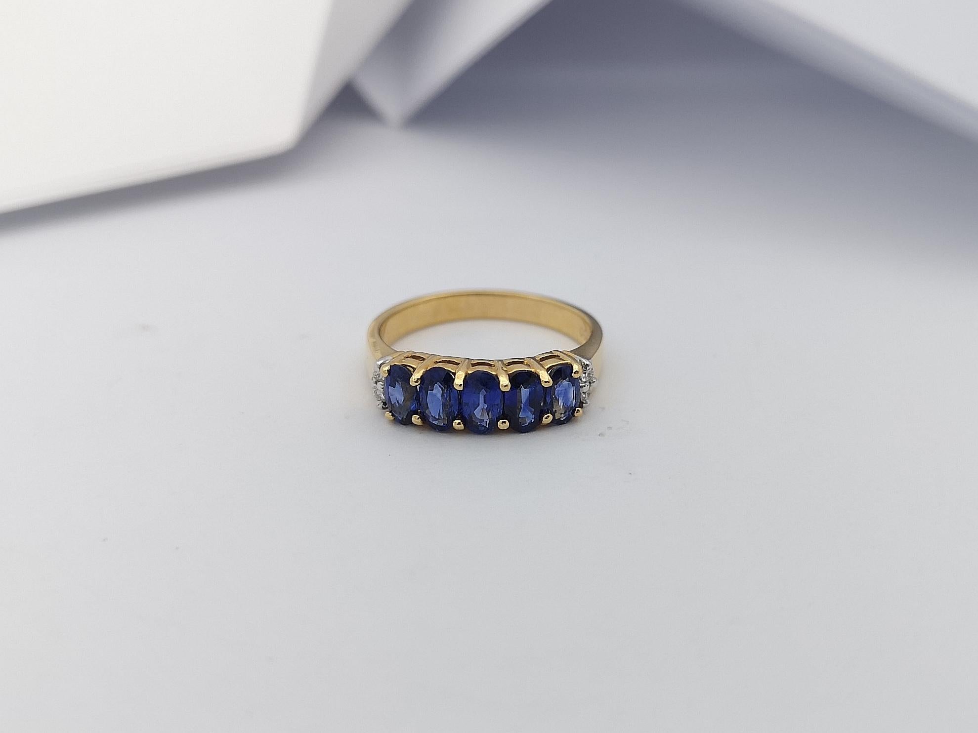 Bague en or 18 carats sertie d'un saphir bleu et de diamants en vente 2