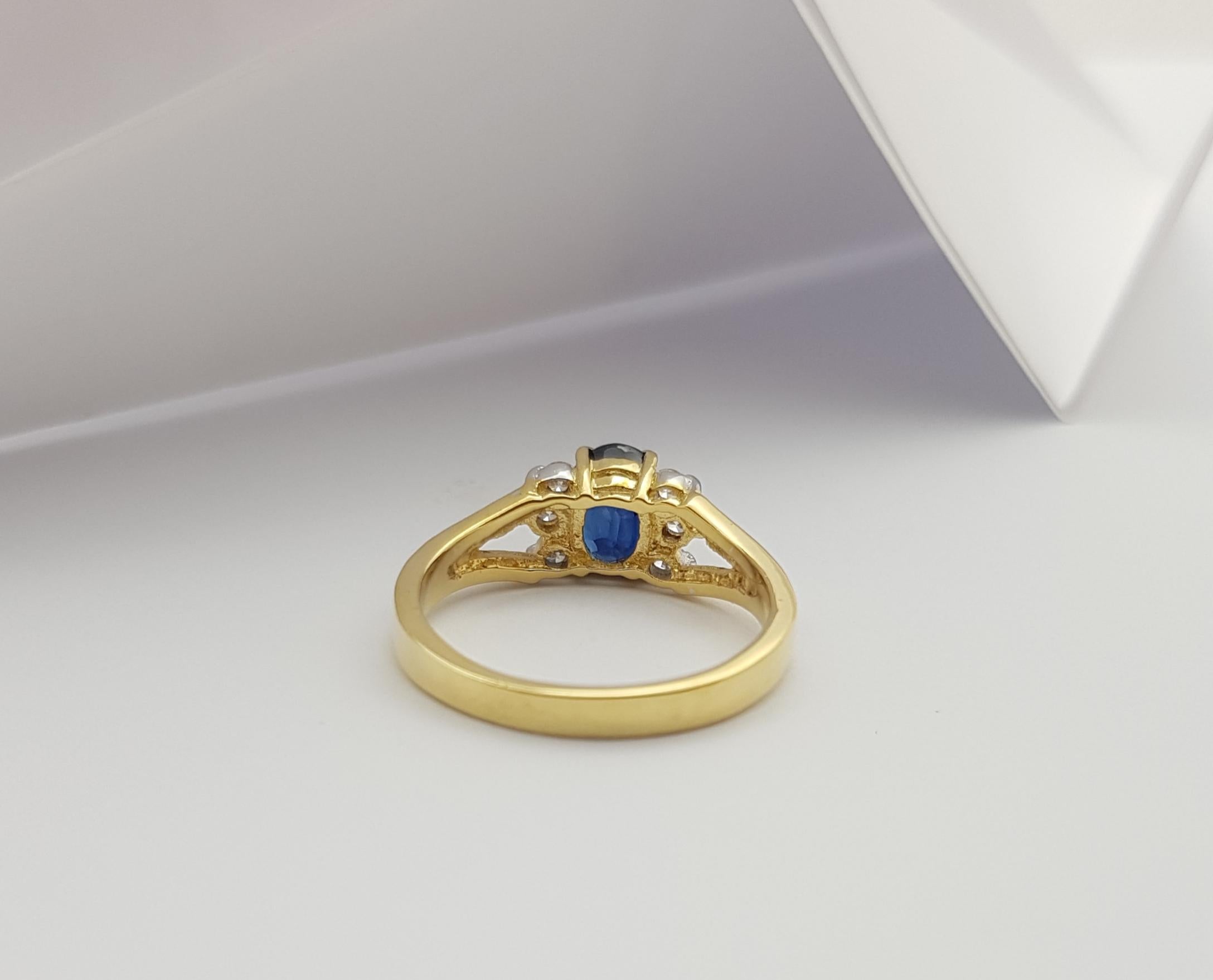 Women's Blue Sapphire with Diamond Ring set in 18 Karat Gold Settings For Sale