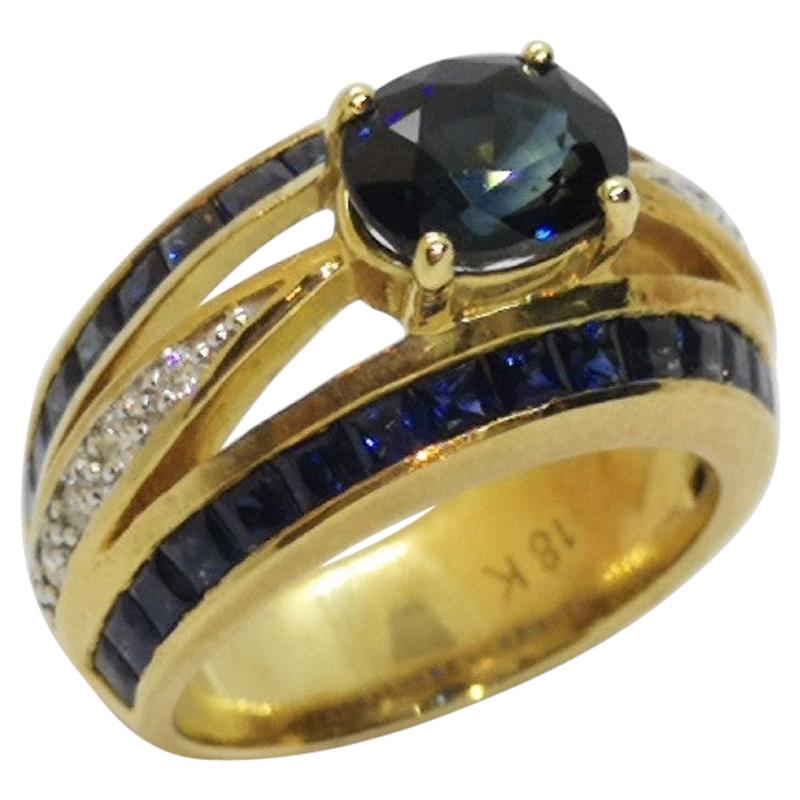 Blue Sapphire with Diamond Ring Set in 18 Karat Gold Settings For Sale