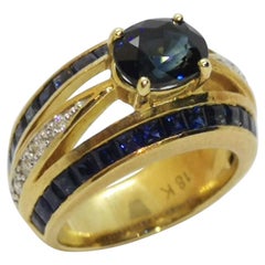 Bague en or 18 carats avec saphir bleu et diamant