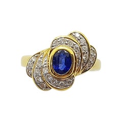 Anillo Zafiro Azul con Diamantes Engastado en Oro de 18 Kilates
