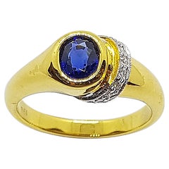 Blue Sapphire with Diamond Ring Set in 18 Karat Gold Settings