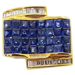 Bague en or 18 carats avec saphir bleu et diamant