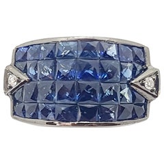 Blue Sapphire with Diamond Ring Set in 18 Karat Gold Settings